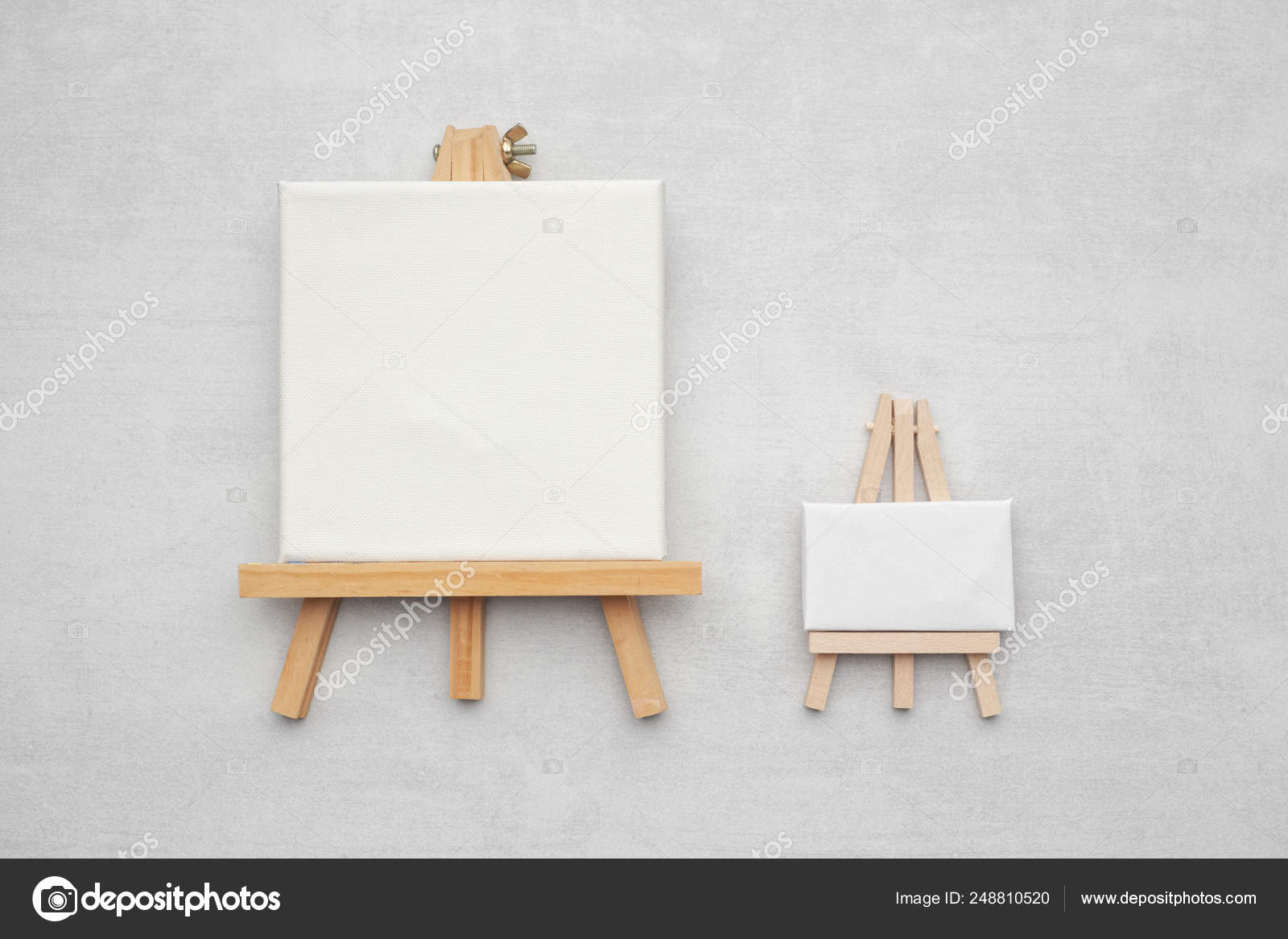 Two small canvases on the easels. Stock Photo by ©ChamilleWhite